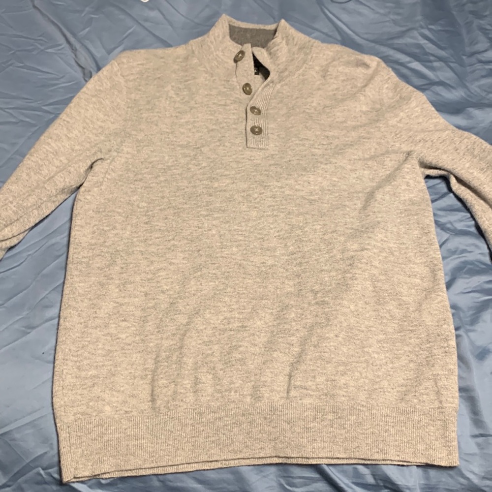 Grey turtleneck, worn a few times, also it has these cool buttons
